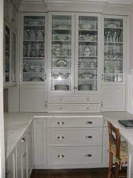 Buy kitchen & pantry cabinets online! Kitchen Kitchen Wooden High Gloss Kitchen Pantry Cabinet White High Gloss Drawers White Ceramic Pottery Clear Glass Pantry Design Butler Pantry Pantry Cabinet