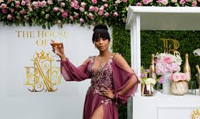 Television presenter, radio personality, author, producer, actress and model. The Throne Mag