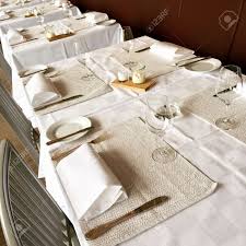 Lay a placemat at each seat, keeping the edge of the placemat one inch from the edge of the table. Elegant And Simple Table Setting In A Classy Restaurant Stock Photo Picture And Royalty Free Image Image 50420247