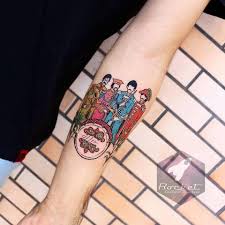 See more ideas about beatles tattoos, the beatles, tattoos. Pin Auf Tatuajes