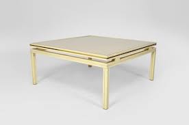 Case in point… the coffee table in the living room. Mid Century Lacquered Aluminium Brass Coffee Table By Pierre Vandel For Sale At Pamono
