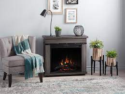 The 23 electric fireplace features a realistic log set and ember bed. Morgan Infrared Rolling Electric Fireplace Heater In Charcoal Oak C3p23lj 2085co C3p23lj 2085co C3 Electric Fireplace Freestanding Fireplace Fireplace Heater