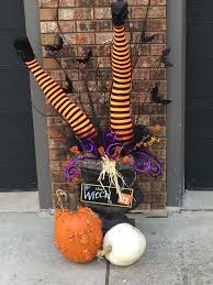 My Favorite Halloween Decoration I Used Two Mannequin Legs A Pair Of Striped Tights And Children S Cost Fall Halloween Crafts Halloween Decorations Witch Diy