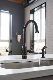 The noell collection embodies elaborate traditional designs to enhance the style and design of any home. Moen 87506brb Mediterranean Bronze Noell 1 5 Gpm Single Hole Kitchen Faucet Includes Side Spray Duralock And Duralast Technology Faucet Com