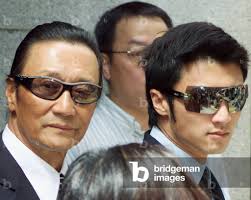 Image of LA POP STAR NICHOLAS TSE LASCIA IL TRIBUNALE CON SUO