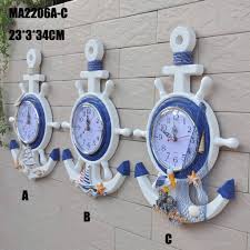 From easy updates, like nautical table lamps and beach themed decor & wall art, to whole room makeovers we have quality lighting, area rugs, and more that will add. 33cm Anchor Clock Beach Theme Nautical Ship Wheel Anchor Decor Wall Hanging Buy At The Price Of 10 04 In Aliexpress Com Imall Com
