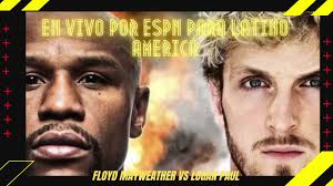 Floyd mayweather, right, throws a punch at logan paul during their exhibition at hard rock stadium in miami gardens, fla. Nwzgcm 4upenkm