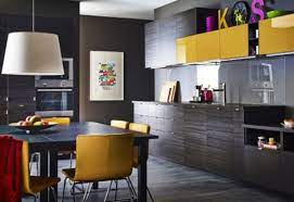 From bold yellow to muted cream, you'll find a shade of yellow here that will help your kitchen yellow birch cabinets with a distressed finish make a colorful statement against walls of white subway tile. Stunning Black Kitchen Design With Yellow Touches Digsdigs