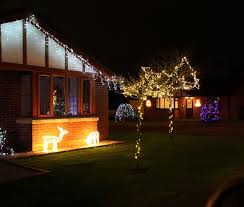 Icicle Lights Outlining The Roof A Tree Dressed With Fairylights And Rope Light Reindeer Our Customers Definitely Hav Led Icicle Lights Icicle Lights Lights