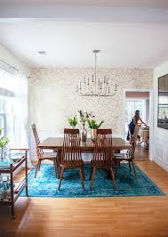 Search for a rug that's large enough for the space and that will help balance the decor of the room (while protecting the floor and. Our Home Tour On Joss Main In Honor Of Design Blue Rugs Living Room Dining Room Rug Home Decor