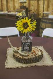 Whiskey Bottle Centerpiece Rustic Wedding Decor Sunflower Themed Wedding Rustic Wedding Decor Wedding Table Centerpieces