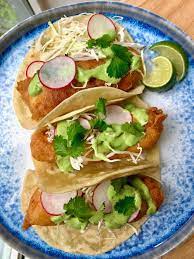 Avocado cilantro lime sauce for fish tacos. Fried Fish Tacos With Avocado Cilantro Sauce Dining By Kelly Recipe In 2021 Fried Fish Tacos Fried Fish Cilantro Sauce