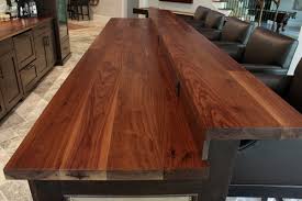 Add a live edge bar top table to your living room to give your guests a place to socialize. Walnut Bar Top Houzz