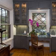 It consists of 3 drawers arranged vertically and 2 side cabinets with glass doors. Glass China Cabinet Houzz