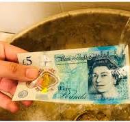 Polymer Banknotes: A Review of Materials, Design, and Printing