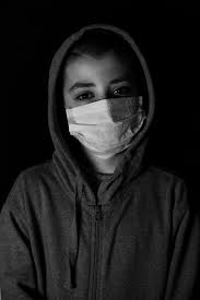 Black and White Photo of a Young Man Wearing a Face Mask in Mountains ·  Free Stock Photo