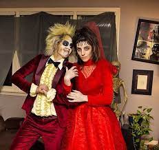 Beetlejuice will appear if you say his name quickly three times in a row. Beetlejuice And Lydia Beetlejuice Lydia Halloween Costume Timburton Halloween Outfits 80s Halloween Costumes Beetlejuice Costume