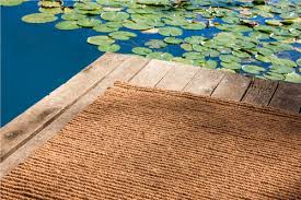 Im flur statt einem läufer mehrere runde teppiche kombinieren Ruckstuhl Ein Teppich Fur Drinnen Und Draussen Detail Magazin Fur Architektur Baudetail