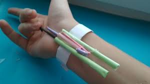 So take a long string of floss and tape it to the ink part. How To Make A Shooting Mini Web Shooter Out Of Paper