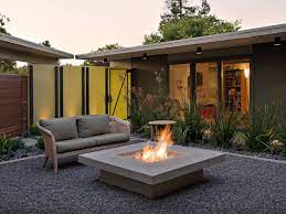 Mid century modern malm fireplaces for sale. Mid Century Modern Courtyard With Sliding Gate And Fire Pit Hgtv