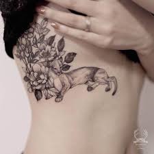 A tattoo artist—and one half of reindeer ink—with a massive instagram following, her blackwork flowers isn't shy when it comes to size or placement. Delicate Nature Tattoos Novocom Top