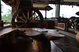 Featuring a unique blend of vintage industrial and contemporary style elements, the. Bullock Cart Wheel And Coffee Table In Olea Dining Area Picture Of Olives Resort Kalpetta Tripadvisor
