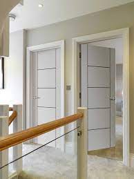 Barn style doors will create a focal point to any interior. White Contemporary Linea Satin White Pre Finished Internal Door With Black Coloured Ladder White Internal Doors Internal Doors Contemporary Internal Doors