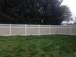 Vinyl Privacy Fence With Mix N Match Beige Panels And White Posts Rails And Caps With A Square Lattice Topper