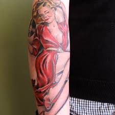 Images of pin up girls have always had a solid place among the top choices for tattoos, particularly for men. Pinup Girl Tattoo Design Ideas Meanings And Photos Tatring