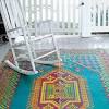 The most common large outdoor rug material is wool. 1