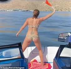In a real perry mason moment, the si spokesperson 'fessed up and admitted that, yes, patrick had been cleaned up with a little photoshop work. Danica Patrick Shows Aaron Rodgers What He Is Missing As She Displays Her Toned Bikini Body Daily Mail Online