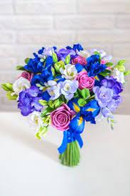 The calla lily also ranges to colors like yellow, orange and pink. 18 Iris Bouquet Ideas Iris Bouquet Bouquet Flower Arrangements