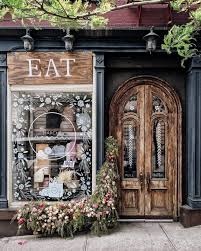 Spring Facades Are The Best Even If The Flowers Are Slowly Wilting And Hey It S Almost Fridayyyyyyy N Cafe Interior Design Coffee Shop Restaurant Door