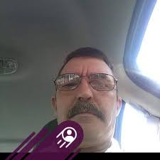 Spark plug wetting and white smoke from muffler in 2001 F150