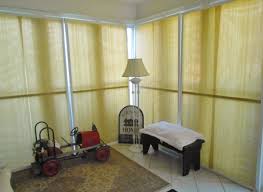 Choose blinds that match the trim in your sunroom and that have a frame that can be anchored to both the top and bottom of the window. Diy Sunroom Window Treatments Diy Inspired