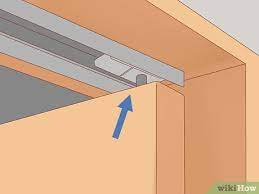 3 Ways To Put A Closet Door Back On The Track Wikihow