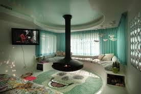 A dip in your room can be an obstacle if you need to add a separating wall to your space. Cozy Living Room Designs With Fireplaces Defined By Sunken And Raised Floor Areas