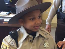 Terminally ill boy made sheriff for a day is being laid to rest with police  honors