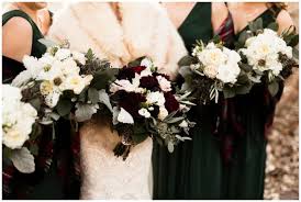 To me emerald green is a perfect color choice for a glam bride. Green And Gold Winter Wedding Minneapolis Florist Ellie And Ryan