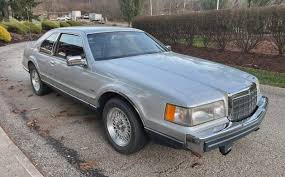 Image result for Silver 1990 Lincoln