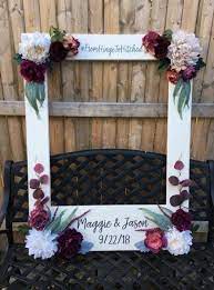 I made this photo booth frame for one of my best friend's bridal shower. Diy Photo Booths Diy Wedding Photo Booth Wedding Photo Booth Props Party Photo Frame