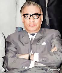 I tried MyHeritage.com. Old Pictures of my grandfather Sir Abdul Razack  Mohamed colourised. Impressive.