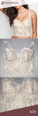 Basically, the top is a corset design with a pink and blue floral pattern on top of sheer white material. Pin On My Posh Picks