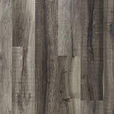 Advancing technology has given vinyl manufacturers have developed shockingly realistic tiles and planks mimicking natural looks, such as wood and stone. Mixed Gray Rigid Core Luxury Vinyl Plank Cork Back 6 5mm 100376847 Floor And Decor