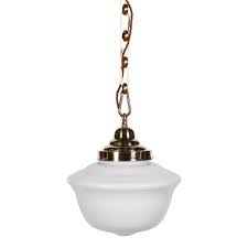 A schoolhouse light can have more than one bulb socket if the space inside the shade allows for it. Frith Nickel Opaque Pendant Light Elesi