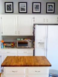 7 Places You Never Thought To Hang Art Decorating Above Kitchen Cabinets Above Kitchen Cabinets Kitchen Cabinets