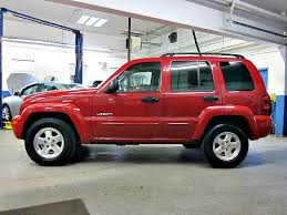 Image result for Flame Red 2004 Jeep