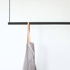 How hard can it be to stick a clothespin on the fabric and put it on a line? Hanging Clothes Rack Ceiling Mounted Hanging Clothes Rack Etsy Hanging Clothes Racks Clothing Rack Retail Clothing Racks