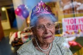 Okemos woman celebrates 101st birthday through a window