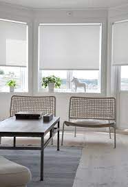 Remodeling 101 Simple Roller Shades Remodelista Living Room Blinds Roller Blinds Kitchen Living Room Windows